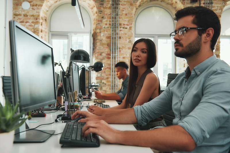 SEO specialist analyzing keyword rankings on a laptop screen